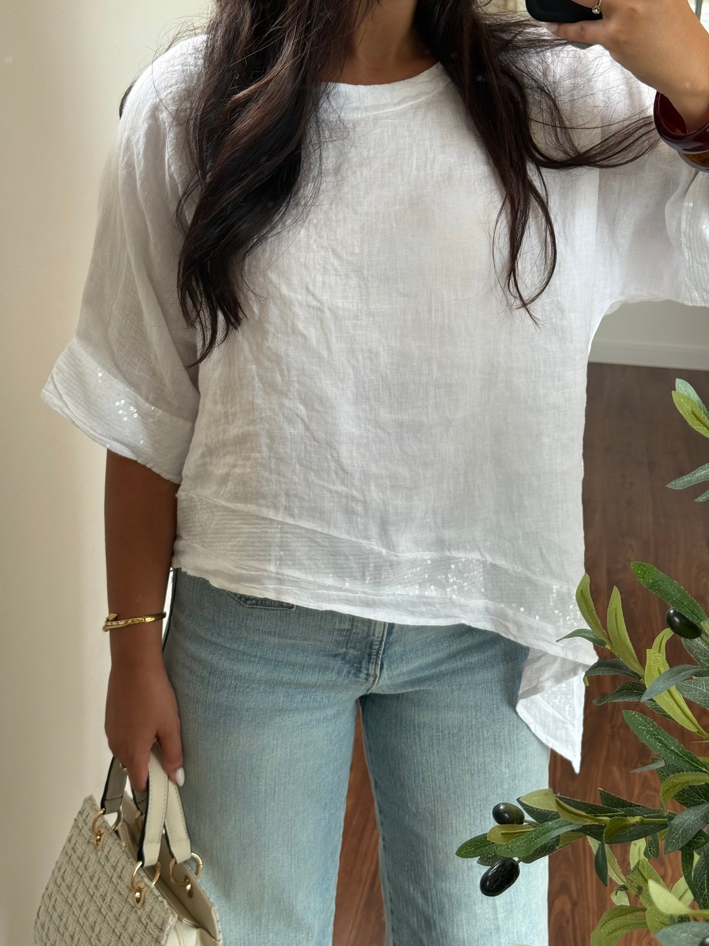 Top asymétrique sequin blanc