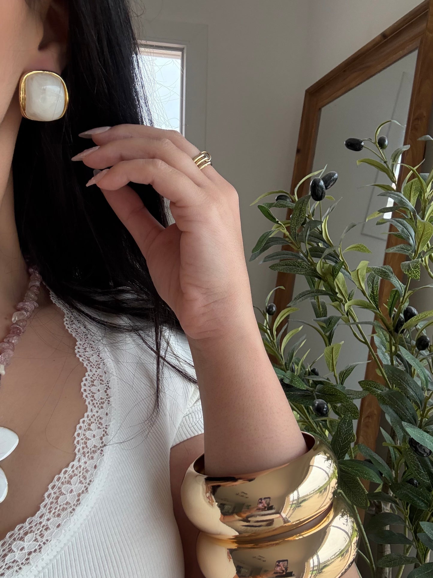 Boucles d’oreilles Ossa blanche